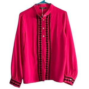 Pink button up shirt with black accents. New with tags.